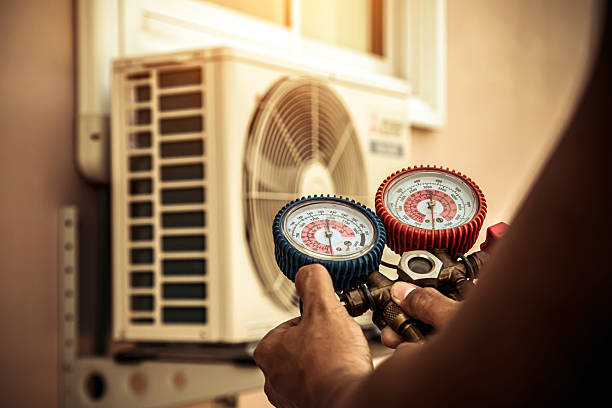 Professional Hvac technician working in Freeman, MO